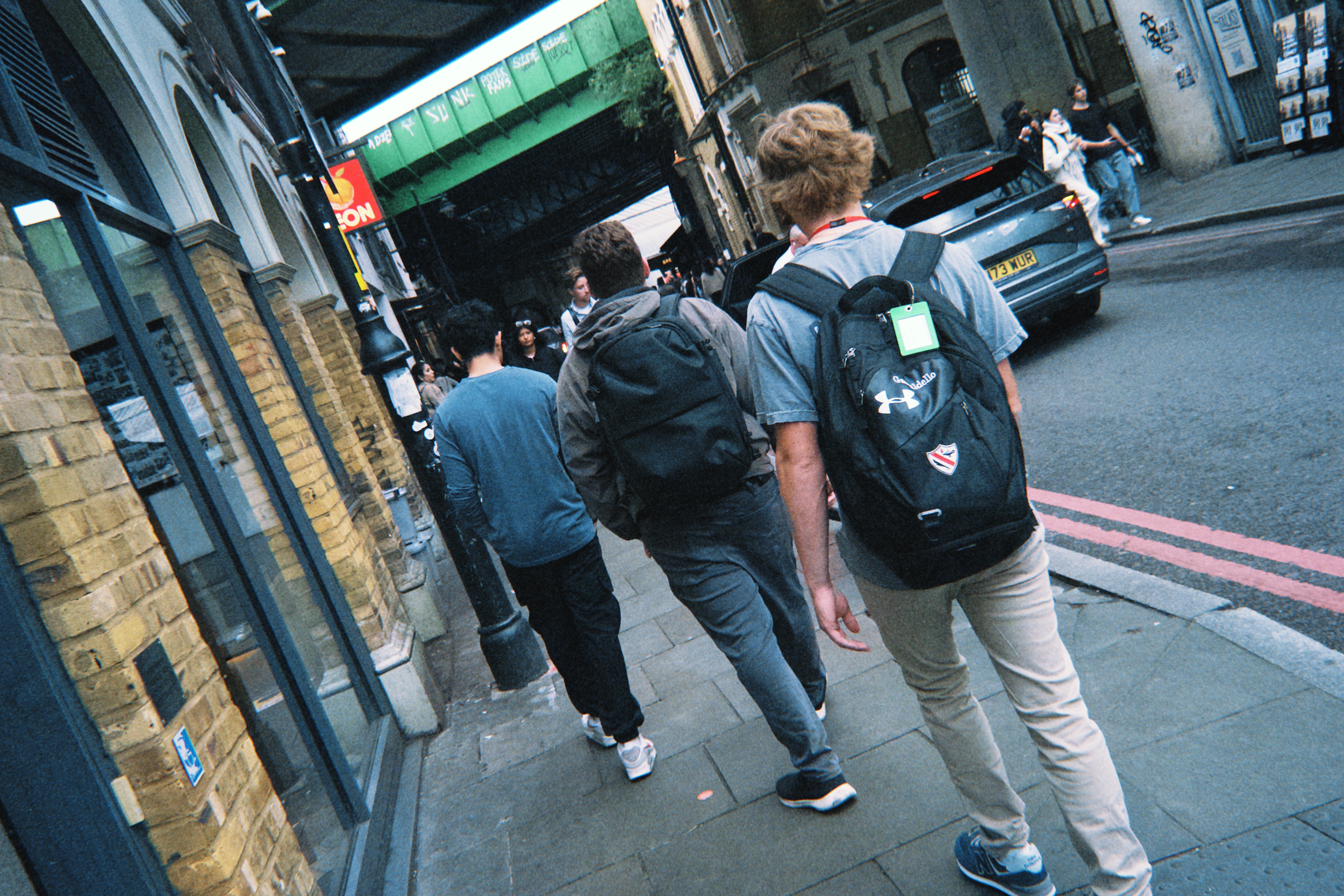 Students walking on the sidewalks in London