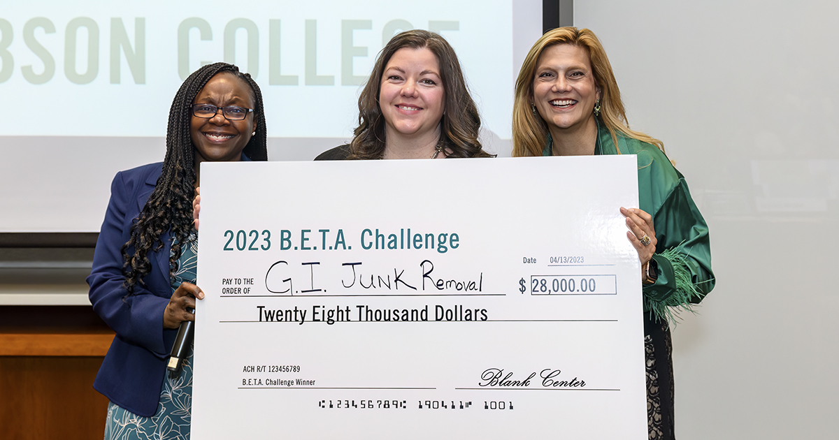 Blank School Leadership holding winning check with BETA 2023 winner