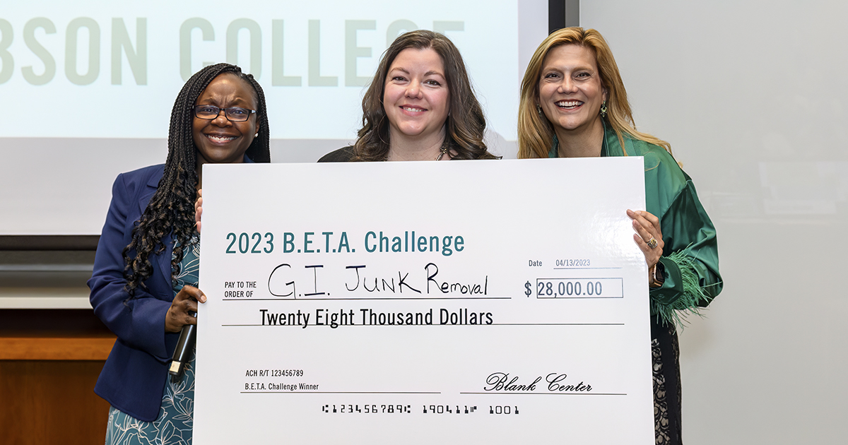 BETA2023 Blank School Leadership holding winning check with BETA 2023 winner