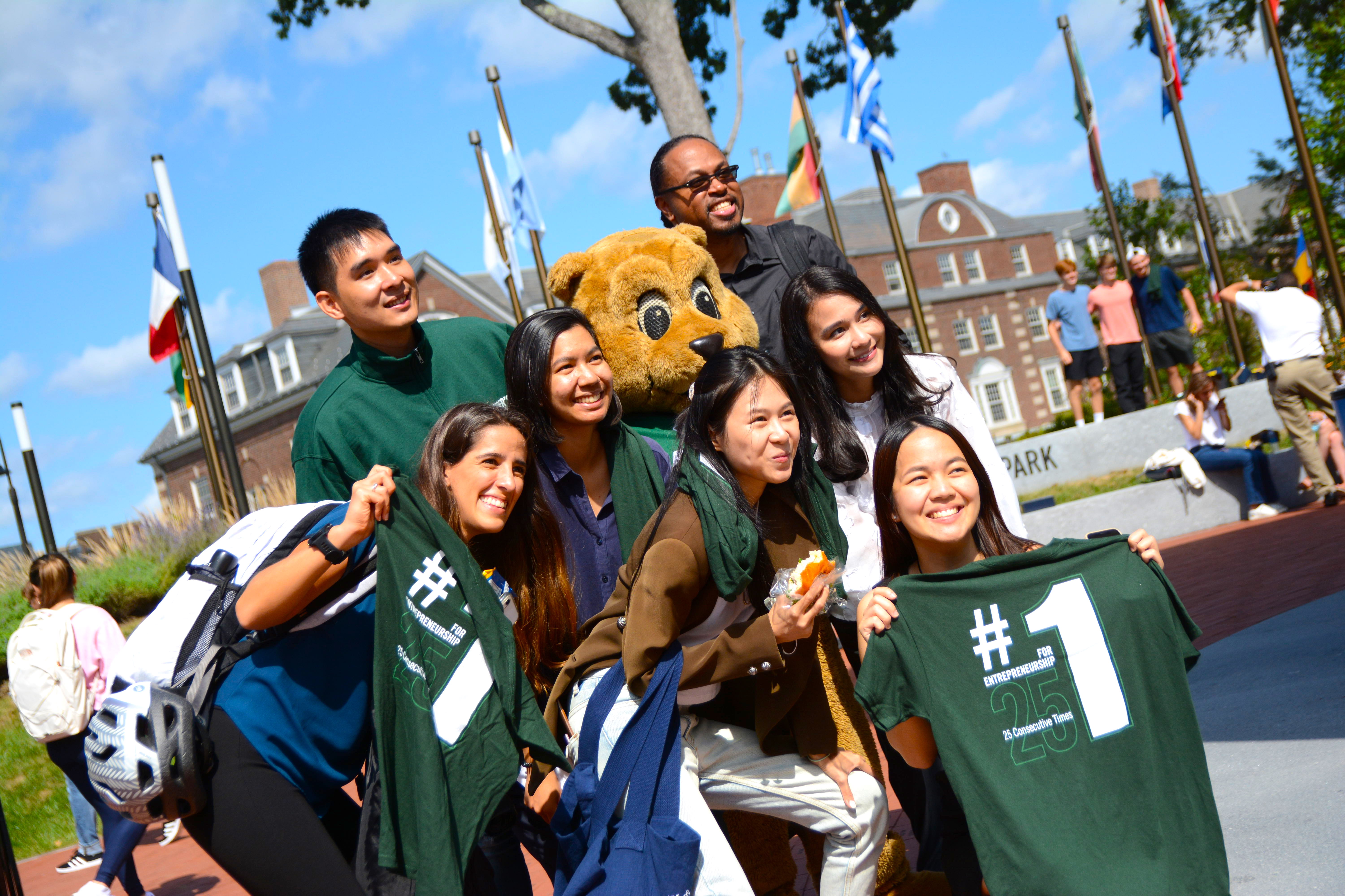 Students holding #1 shirt