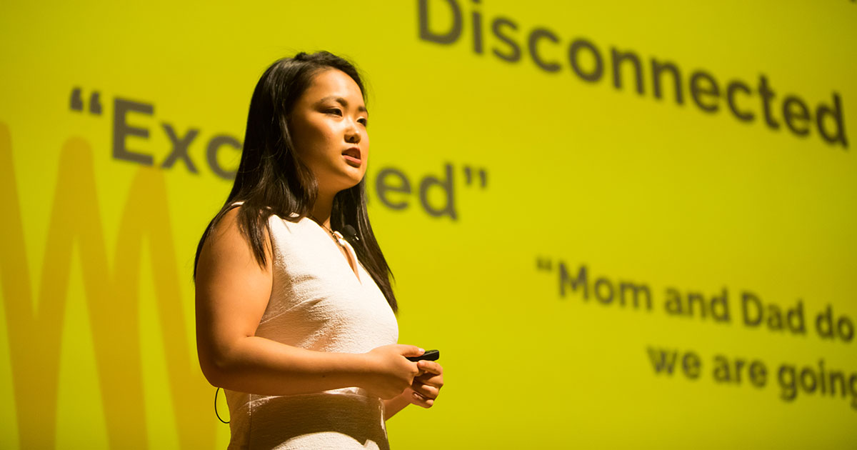 Summer Venture Program Woman Pitching on Stage