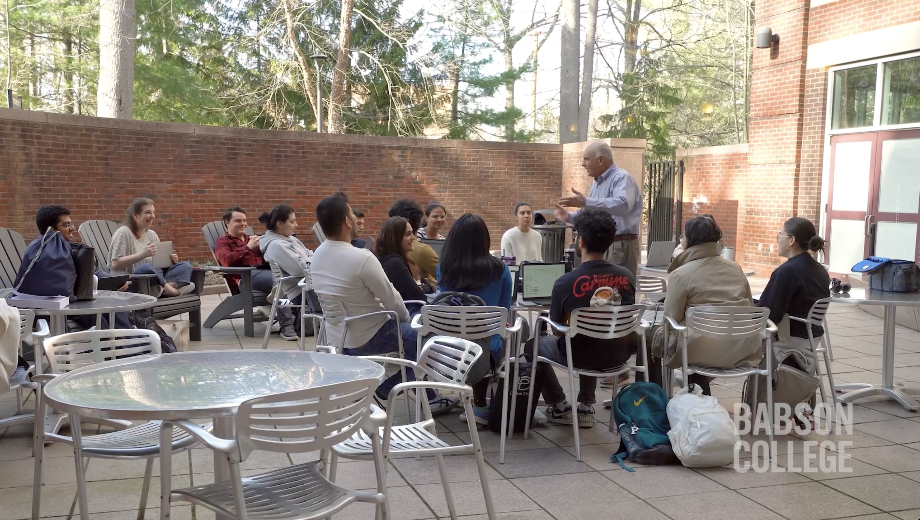 professor teaching class outside