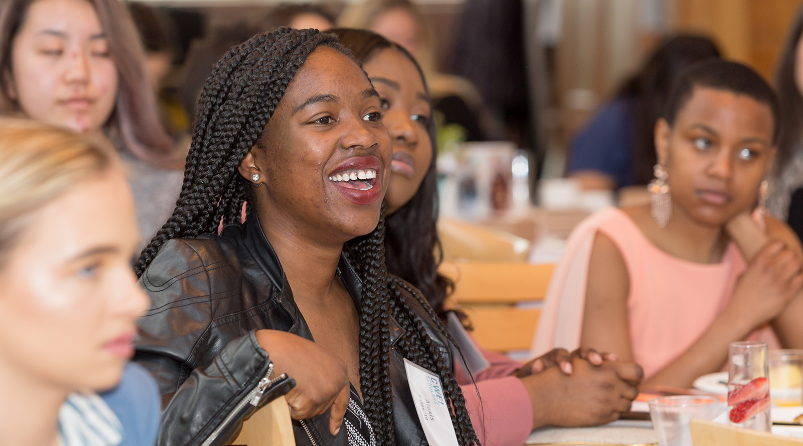 Header - Undergrad Laughing at event