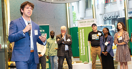 A student presents on AI in a business setting