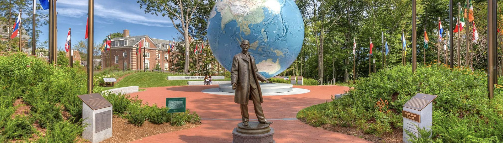statue of Babson in front of the globe