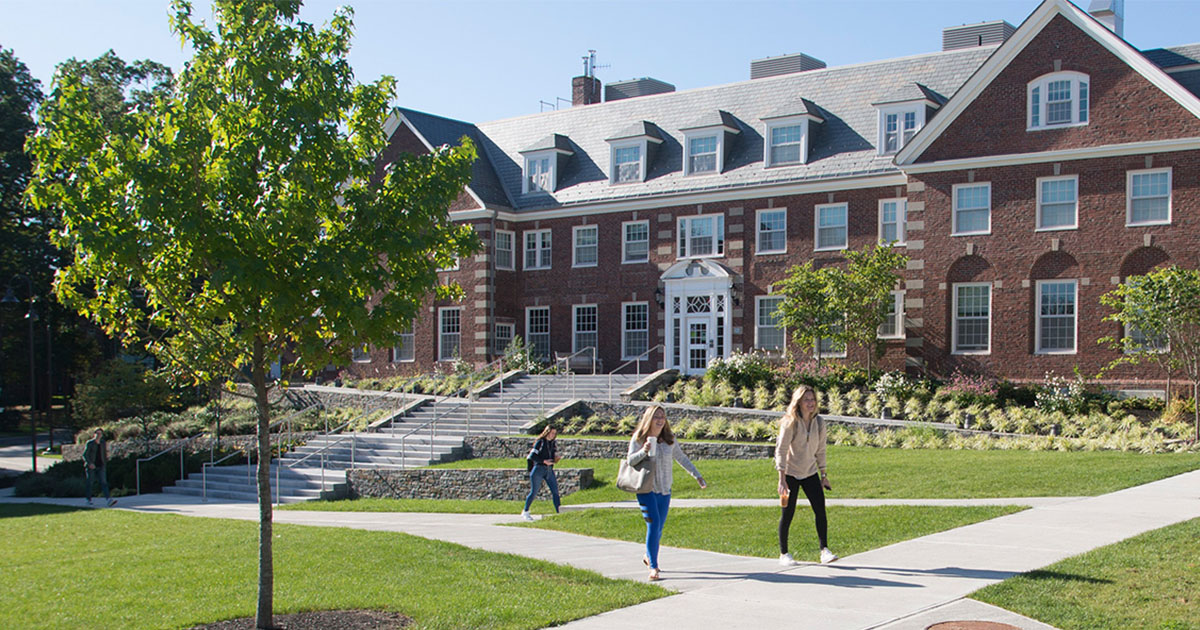 two people walking through Babson campus