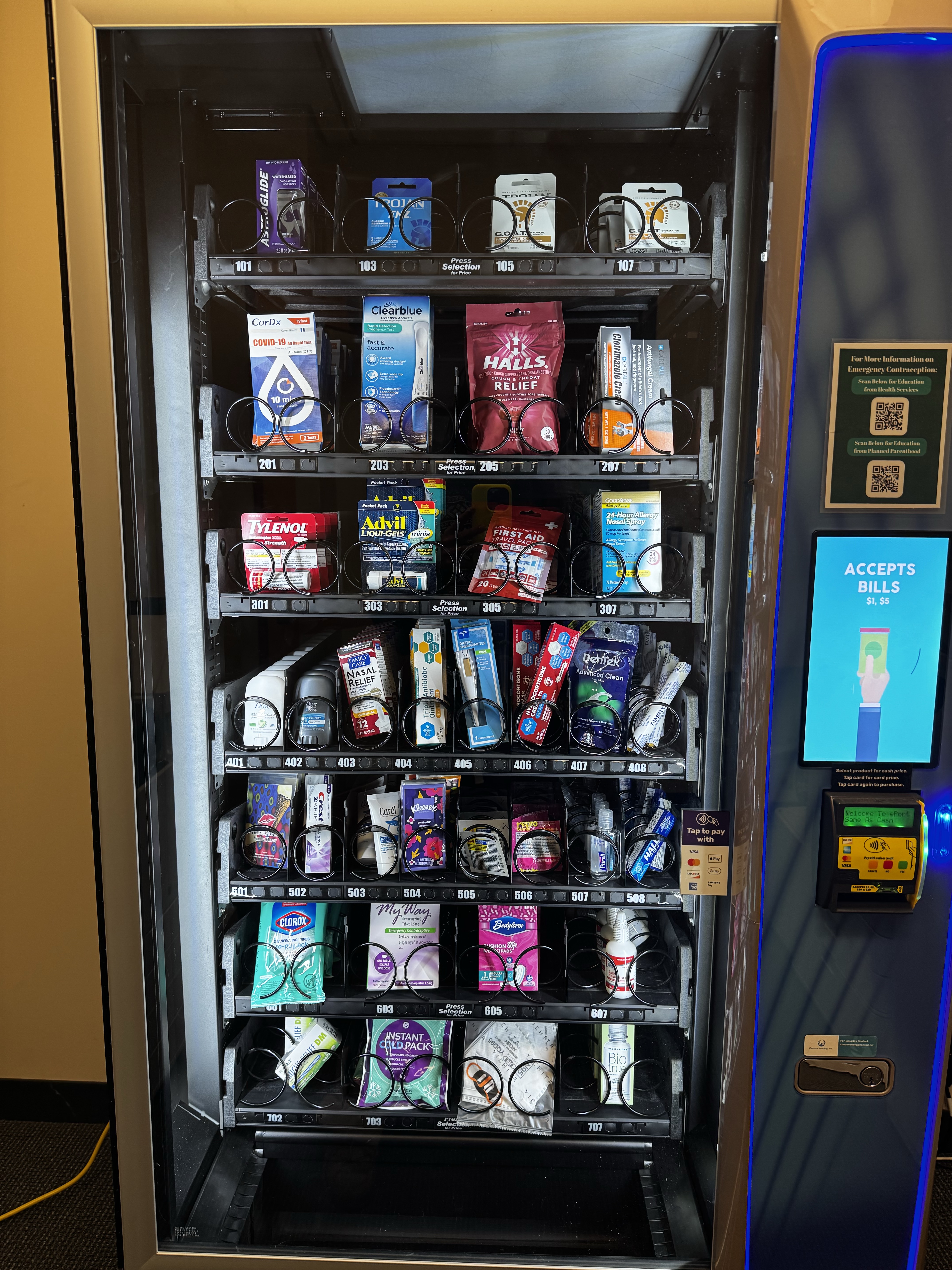 A picture of a vending machine, stocked with health and wellness products.