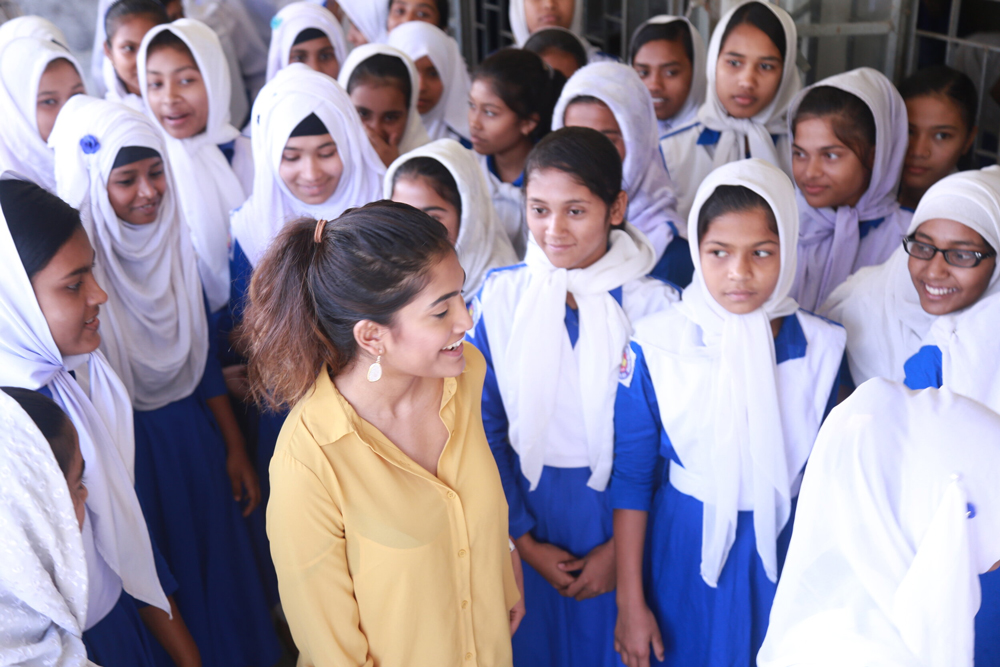 Aria Mustary with youth in Bangladesh