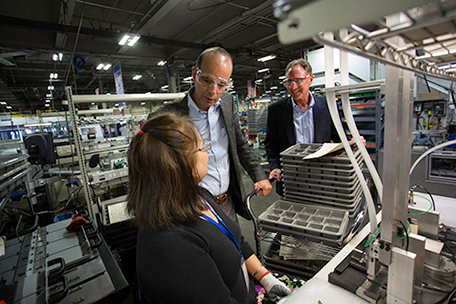 group of people in industrial setting