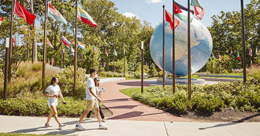 Students Walking by Babson Globe