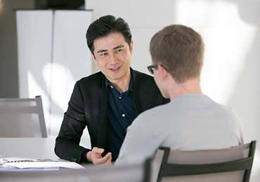 Student sitting and speaking