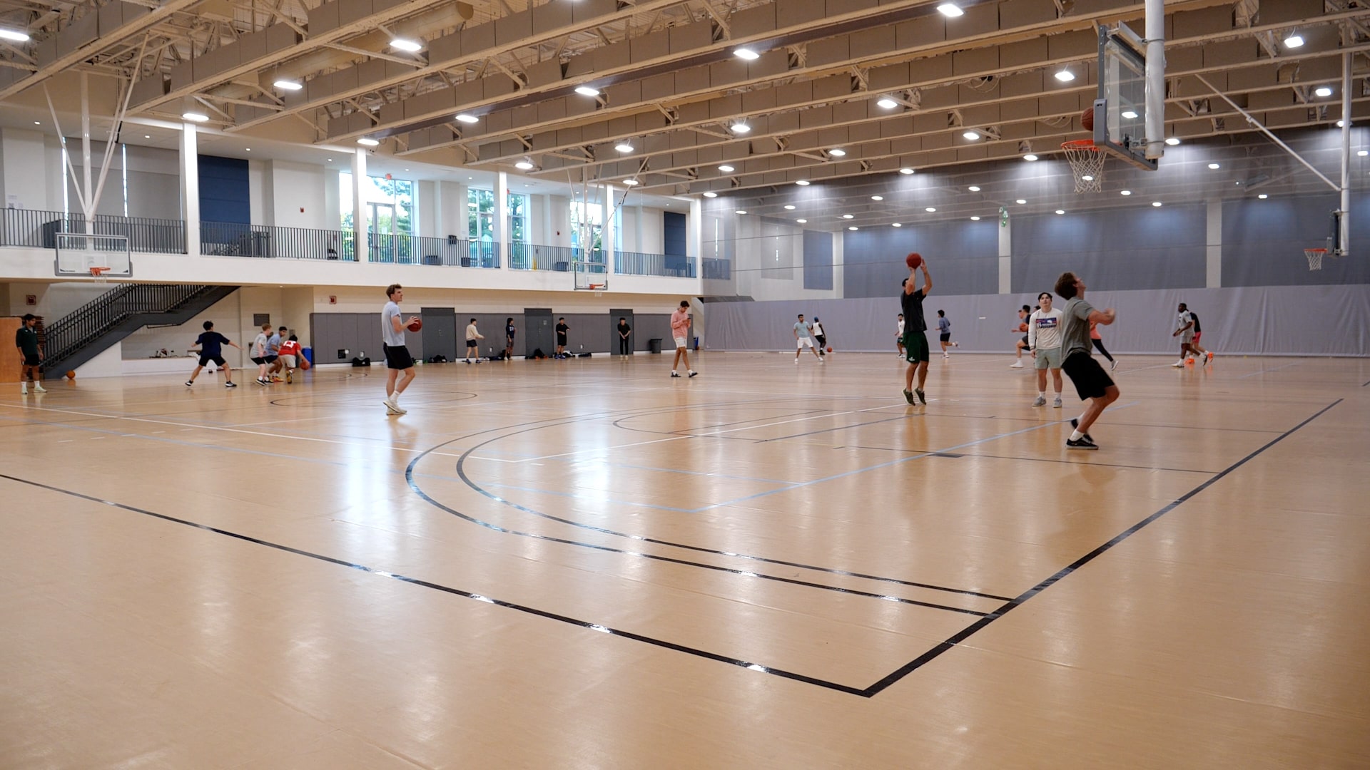 Students on basketball courts