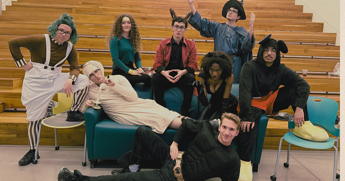 A group of students dressed in costumes